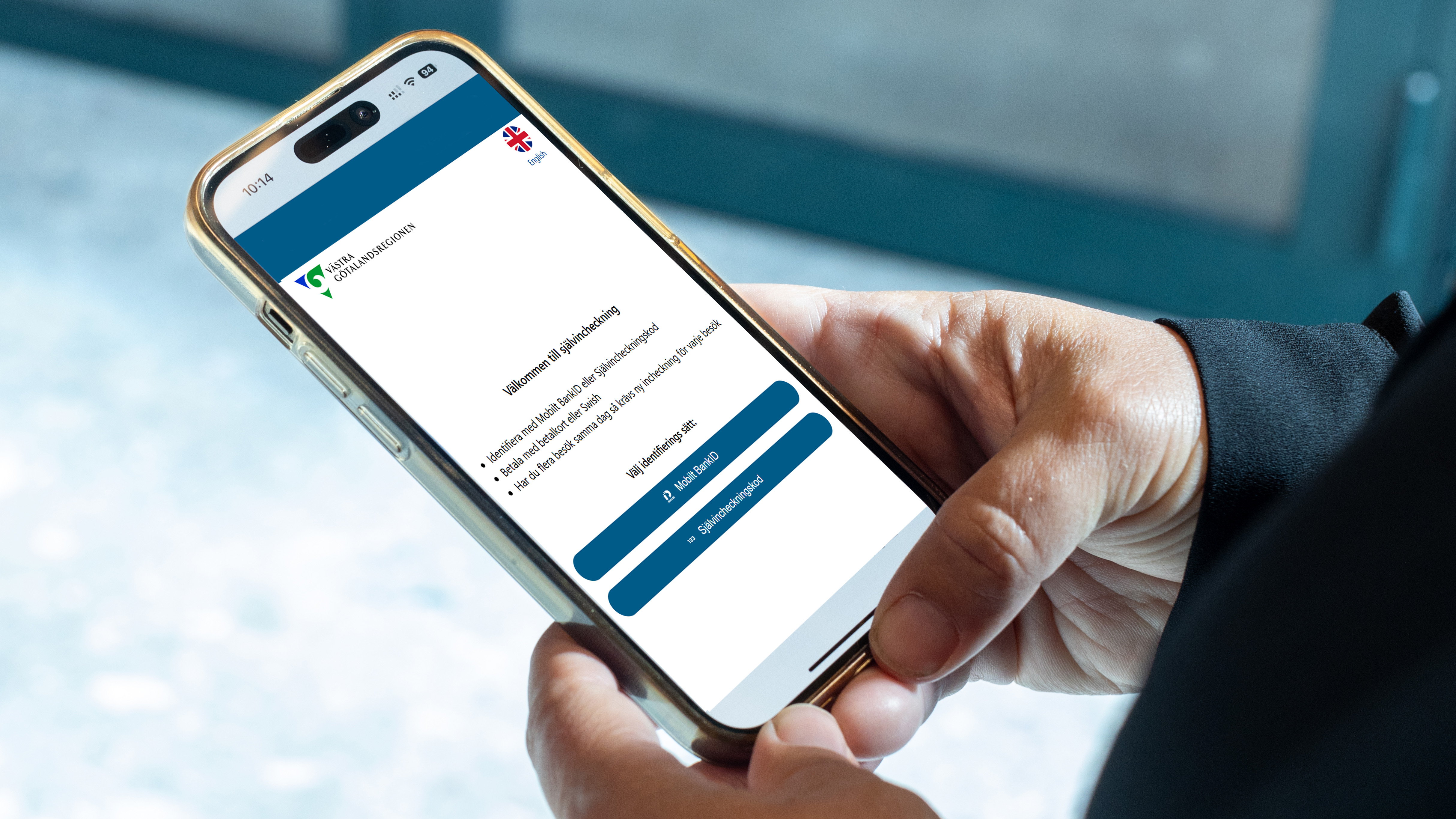 Mobilgränssnitt för självinchekning, i handen på en användare