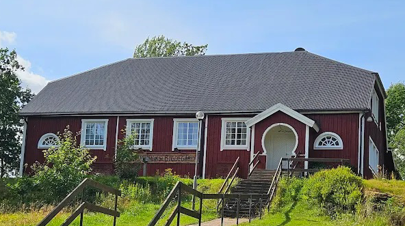 Rött hus med texten bygdegård